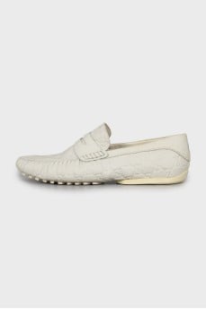 Men's white loafers with embossed leather