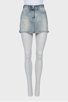 Denim mini skirt with raw edge