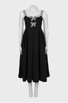 Dress decorated with rhinestones on straps