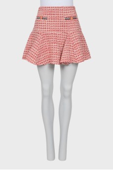 Tweed skirt decorated with buttons