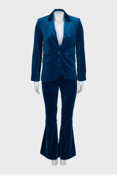Velour suit with flared trousers and tag