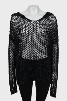 Knitted sweater with a hood