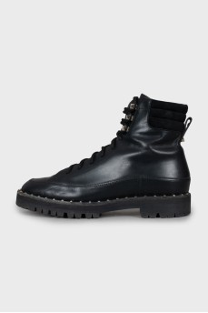 Leather boots decorated with spikes