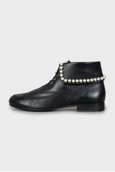 Leather boots decorated with beads