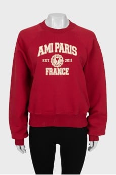 Red sweatshirt with text print
