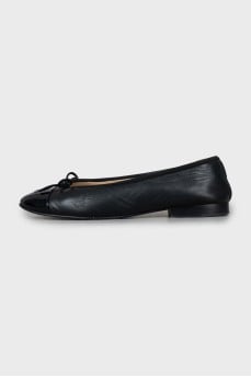 Black leather ballet flats with patent toe