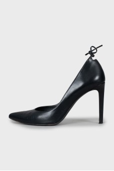 Leather shoes with ties at the back