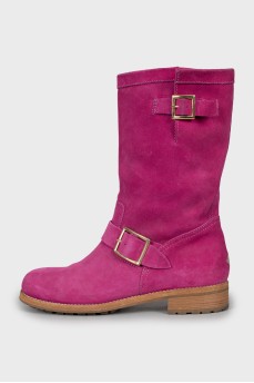 Pink boots decorated with buckles
