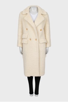 Double-breasted fur coat with fringe