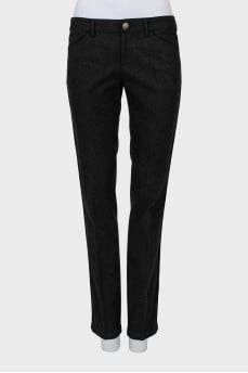 Dark grey trousers with arrows