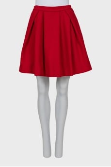 Red pleated skirt
