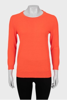 Knitted jumper in orange color
