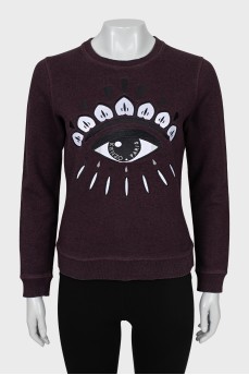 Purple sweatshirt with embroidered print