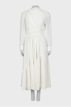 Fitted dress with draped sleeves
