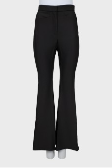 Flared trousers with stitched creases