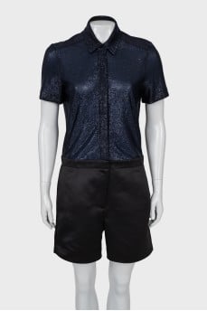 Blue jumpsuit with short sleeves