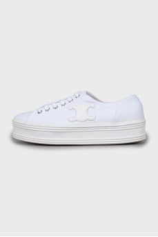 White sneakers with branded patch