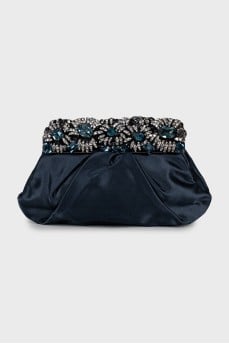 Clutch decorated with rhinestones and drapery