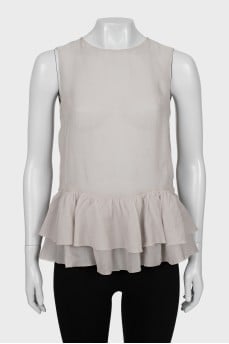 Silk blouse with ruffles at the bottom