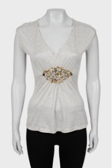 Gray T-shirt decorated with rhinestones