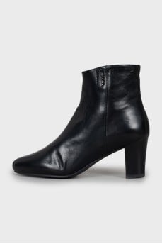 Black leather ankle boots with logo