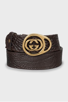 Brown belt with gold buckle