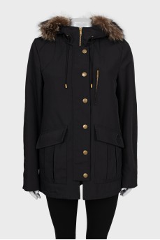 Black parka with gold fittings