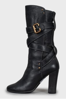 Leather boots with gold fittings