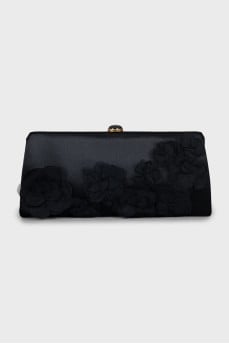 Textile clutch decorated with flowers