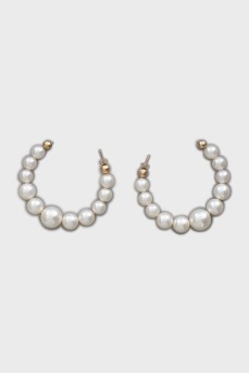 Massive earrings made of artificial pearls
