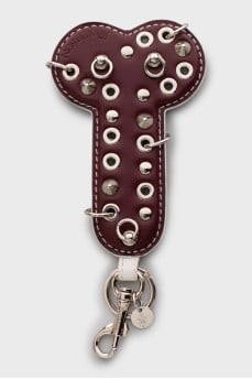 Keychain decorated with eyelets and spikes