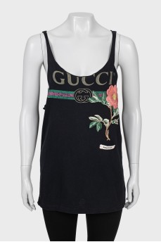 Black T-shirt decorated with embroidery