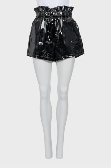 Patent leather shorts with tag