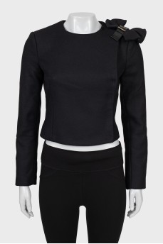 Fitted jacket with shoulder decoration