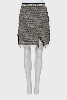 Pencil skirt decorated with fringe