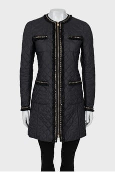 Quilted jacket decorated with fringe