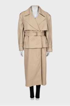 Trench coat with detachable sleeves and hem with tag