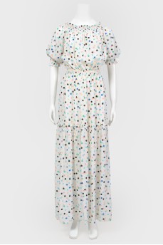 White dress in colored peas
