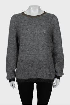 Knitted sweater in gray color