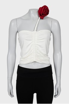 Top decorated with drapery and tag