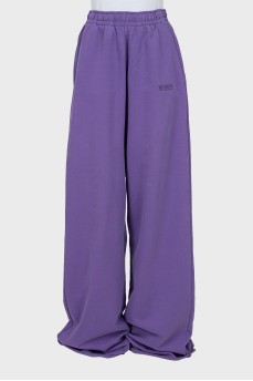 Trousers with brand logo