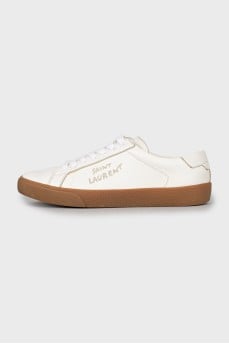 Leather sneakers decorated with embroidery