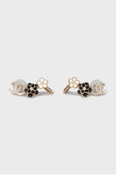 Earrings with brand logo decorated with crystals