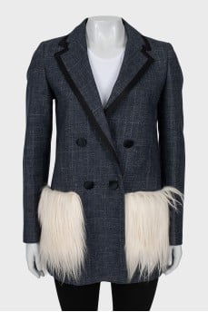 Jacket with patch pockets decorated with fur