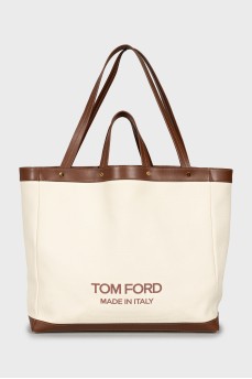 Bag with leather handles and signature print