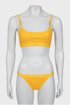 Orange swimsuit with tag