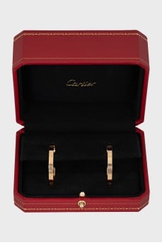 Gold stud earrings
