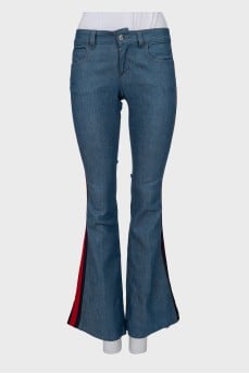 Flared jeans with contrasting side stripes