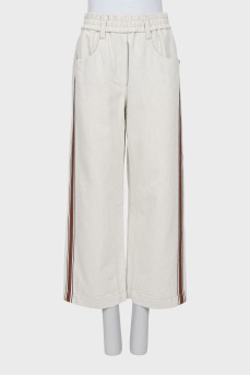 Cropped trousers with contrasting stripes