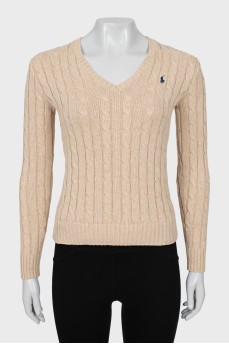 Knitted pullover in beige color